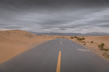 An empty highway going through the desert, Inner Mongolia, China