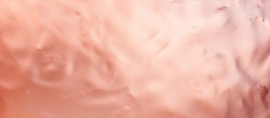 Fototapeta premium Vibrant close-up shot of a pink wall with a prominent red fire hydrant in focus