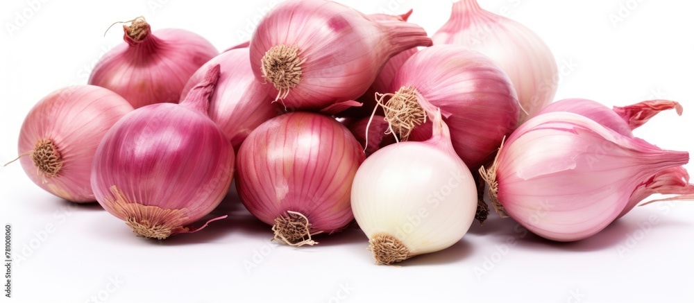 Poster a close-up view of multiple onions stacked on a plain white surface