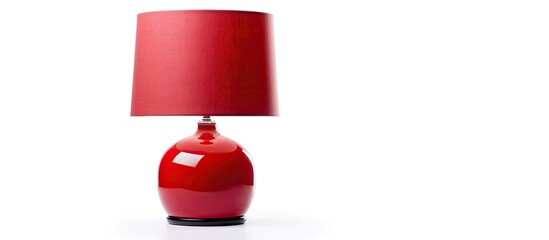 A detailed close-up of a red lamp accentuated by a matching vibrant red shade