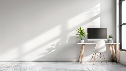Minimalist home office setup with computer on wooden desk, white chair, and sunlight casting shadows wall