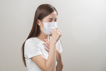 Unhealthy sickness, unwell asian young woman wearing mask coughing, have sore throat, suffering...