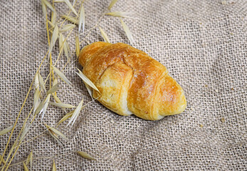 Small croissants on organic fabric