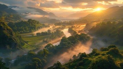 A mist-covered river valley at sunrise, with verdant hillsides bathed in soft golden light. - obrazy, fototapety, plakaty