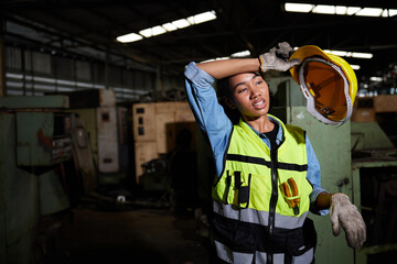 worker or engineer feeling tired from hot weather over heat in the factory