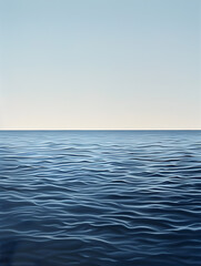 Obraz premium A calm ocean with a blue sky in the background. The water is still and the sky is clear