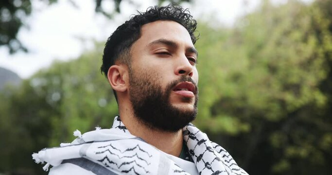 Outdoor, thinking and man in nature, face and serious in woods, calm and peace to relax in park. Morning, contemplating and Muslim male person with scarf, wonder and thoughtful in location of forest