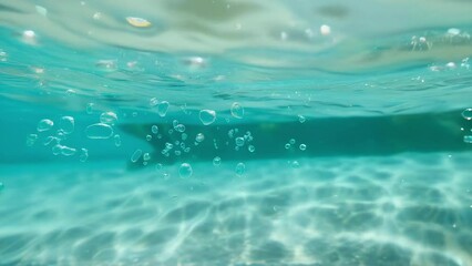 underwater tranquility crystal clear water showcasing a dance of air bubbles rising to the surface, illuminated by natural sunlight