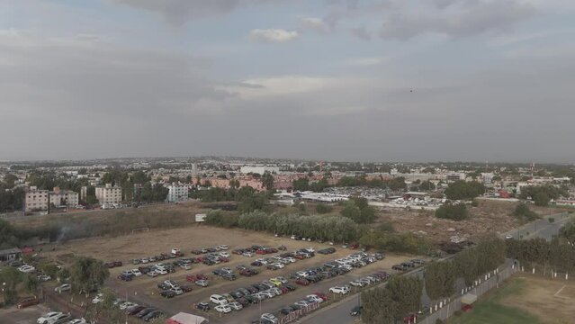 Overflight in cuautitlan mexico, houses, apartments, buildings, parking lots and cilo in destruction, train station, suburban cuautitlan