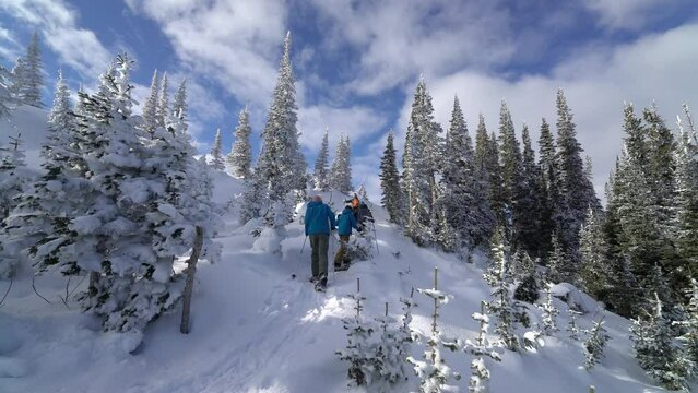 Snow Shoeing ascending mountain in Montana