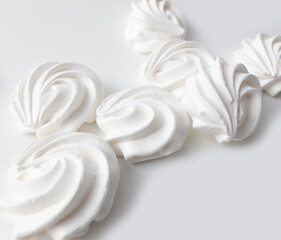 Closeup of white creamy marshmallow isolated on white background