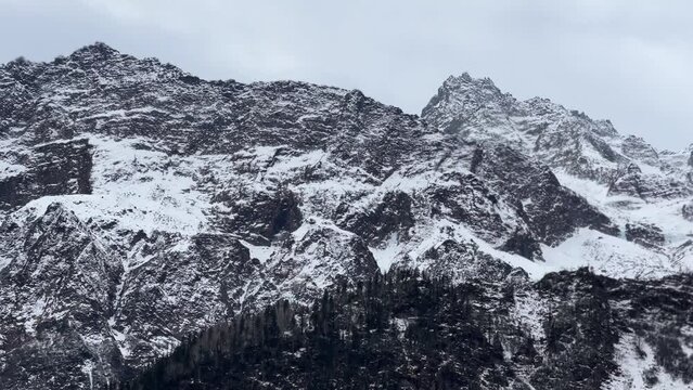 Snow filled mountains with blue skies landscape near Manali Kashmir Rothang pass India