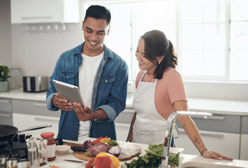 Tablet, cooking and couple in kitchen together with healthy food, relationship or happy in home....