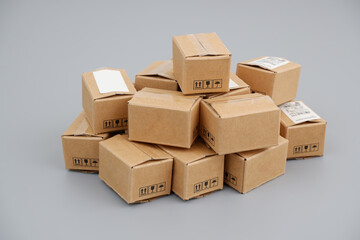 Shipping carton boxes on gray background. Delivery goods concept.	