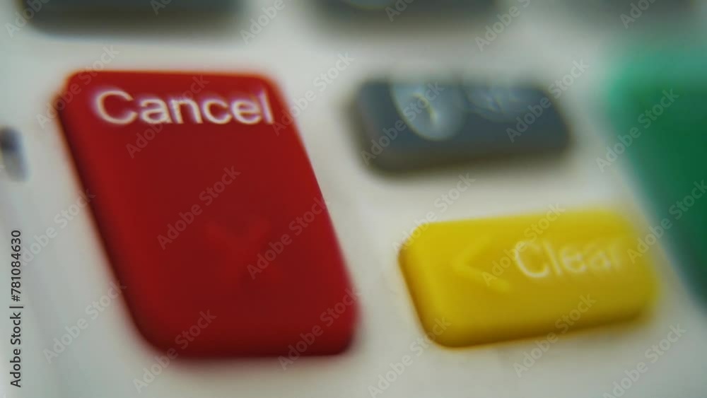 Poster a macro close up shot of a pin pad numbers and letters on colorful buttons, smooth tilt down movemen