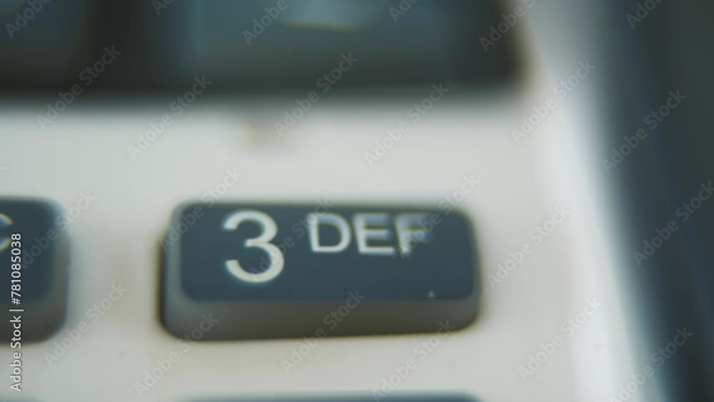 Aufkleber a macro close up shot of a pin pad numbers and letters on colorful buttons, slide right movement, 4k