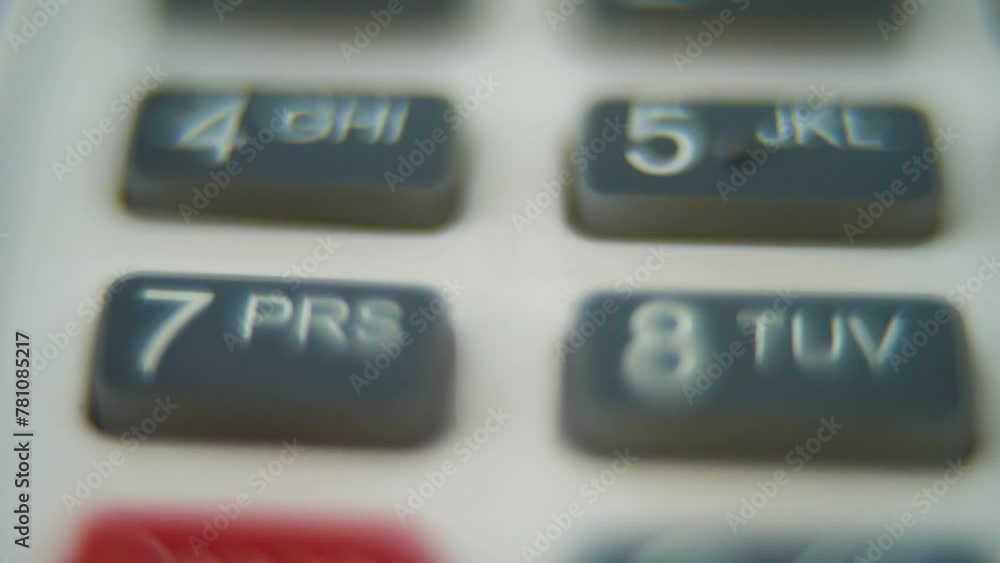 Poster a macro close up shot of a pin pad numbers and letters on colorful buttons, smooth zoom in movement,