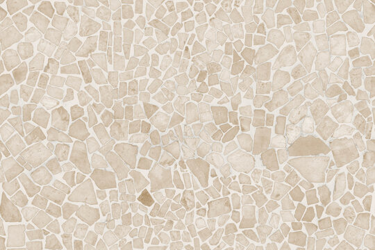 Seamless high-resolution texture of biege stone fragments