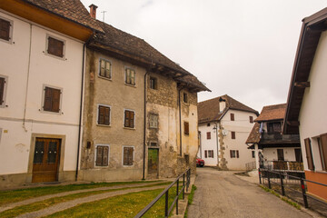 Historic residential buildings in the mountain village of Ovasta in Carnia, Udine Province, Friuli-Venezia Giulia, north east Italy