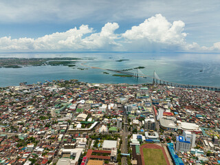 Top view of Cebu city with tall buildings. Cebu Cordova Link Expressway. Philippines.