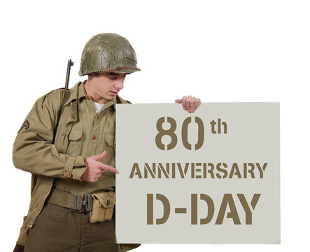young American soldier shows a sign 80 th anniversary of D DAY