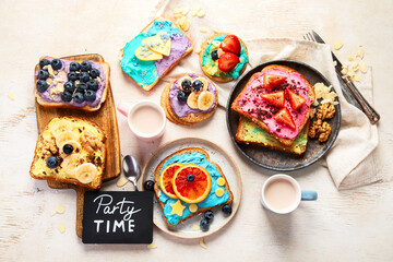 Sweet breakfast with cup of cocoa. Toast with cream cheese, banana, strawberries, blueberries - obrazy, fototapety, plakaty