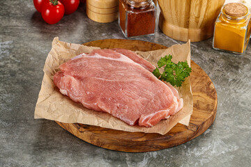Raw pork schnitzel for cooking