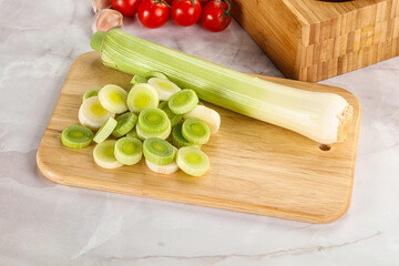 Ripe sliced leek over board