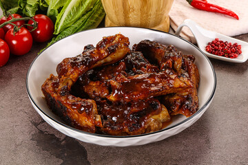 Grilled pork ribs in barbecue sauce