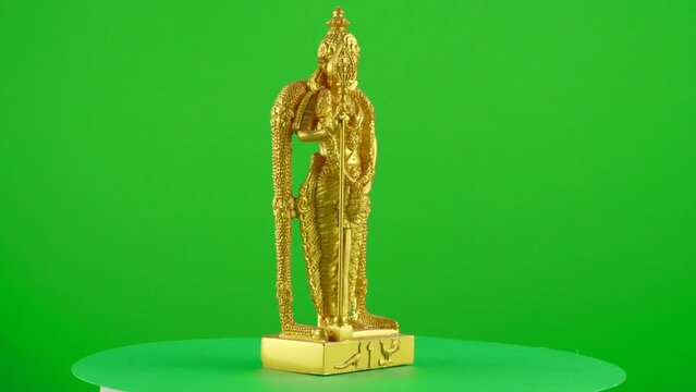 lord murugan thaipusam Gold Batu caves malaysia Kuala Lumpur Indian Tamil miniature statue figure on green background chroma key background replacement backdrop objet in a turntable 3d spinning loop