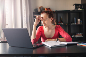 Millennial student sit at desk study on laptop - 781102838
