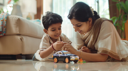an Indian mother and her 5-year-old son fixing a toy car,