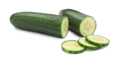 Halves and slices of long cucumber isolated on white
