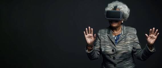 An older Black woman is wearing a virtual reality headset and exploring a digital environment