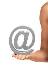 Closeup, @ sign and person with hand, symbol and promotion isolated on white studio background....