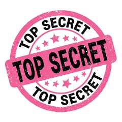 TOP SECRET text written on pink-black round stamp sign.