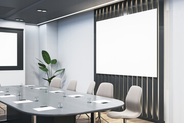 Naklejka premium Contemporary wooden and concrete conference room interior with empty white mock up billboard and furniture. Presentation concept. 3D Rendering.