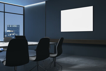 Modern boardroom with empty white poster on wall, conference table and chairs, night city view outside, concept of business meeting space. 3D Rendering