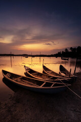 Traditional boats at O Loan lagoon in sunset, Phu Yen province, Vietnam