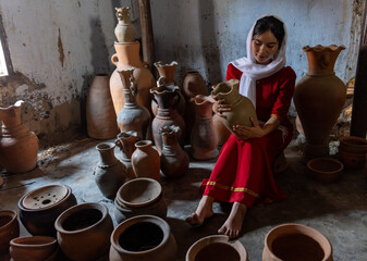 portrait of Cham ethnic girl in Bau Truc pottery village, Phan Rang city, Ninh Thuan province,...