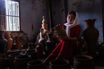 portrait of Cham ethnic girl in Bau Truc pottery village, Phan Rang city, Ninh Thuan province, Vietnam