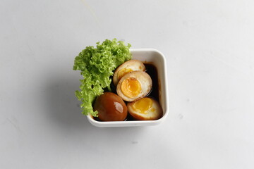 dark soy sauce japanese lava braised chicken egg yolk chinese herbal tea in bowl on white table asian restaurant banquet cafe cuisine halal food menu