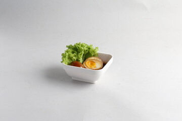 dark soy sauce japanese lava braised chicken egg yolk chinese herbal tea in bowl on white table asian restaurant banquet cafe cuisine halal food menu