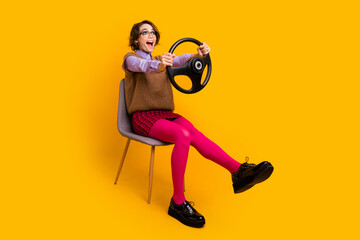 Photo portrait of attractive young woman sit chair hold steering wheel dressed retro office clothes...