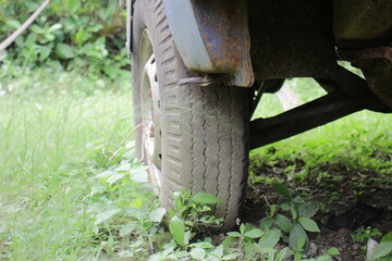 Closeup of Damaged and Flat Car Tires