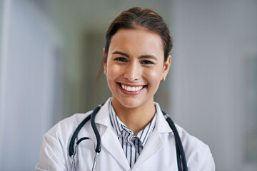 Smile, woman and portrait of doctor in hospital with positive, good and confident attitude. Happy,...