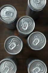 Tin can for drinks on a wooden background