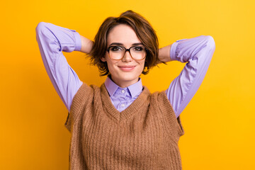 Photo of good mood girl dressed knitwear waistcoat in glasses holding arms behind head on coffee...