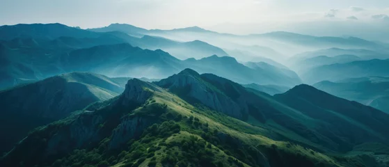 Fotobehang Aerial view of mountain range in the mountains © Pixel Pine