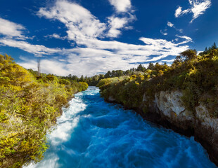 Naklejka na ściany i meble Waterscape landscape of the Waikato River in New Zealand